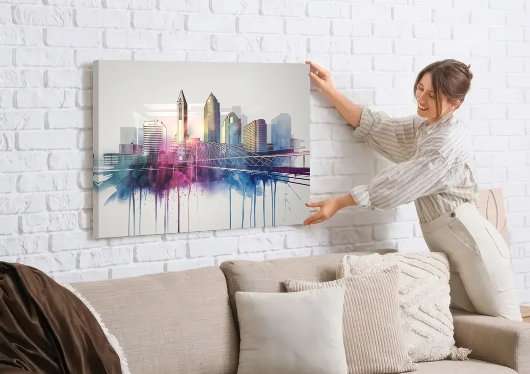 Columbus Ohio Skyline canvas wall art being hung on a white brick wall above a sofa