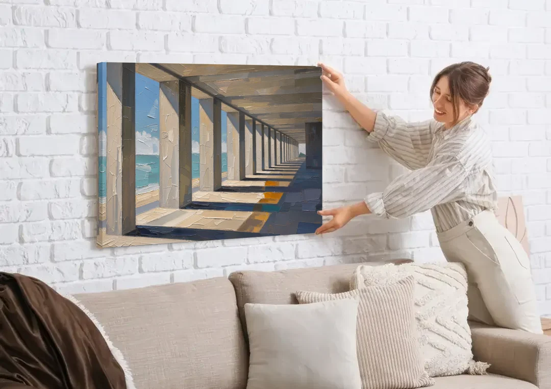 Conference Room Wall Art of a Seaside Colonnade canvas wall art being hung on a white brick wall above a sofa