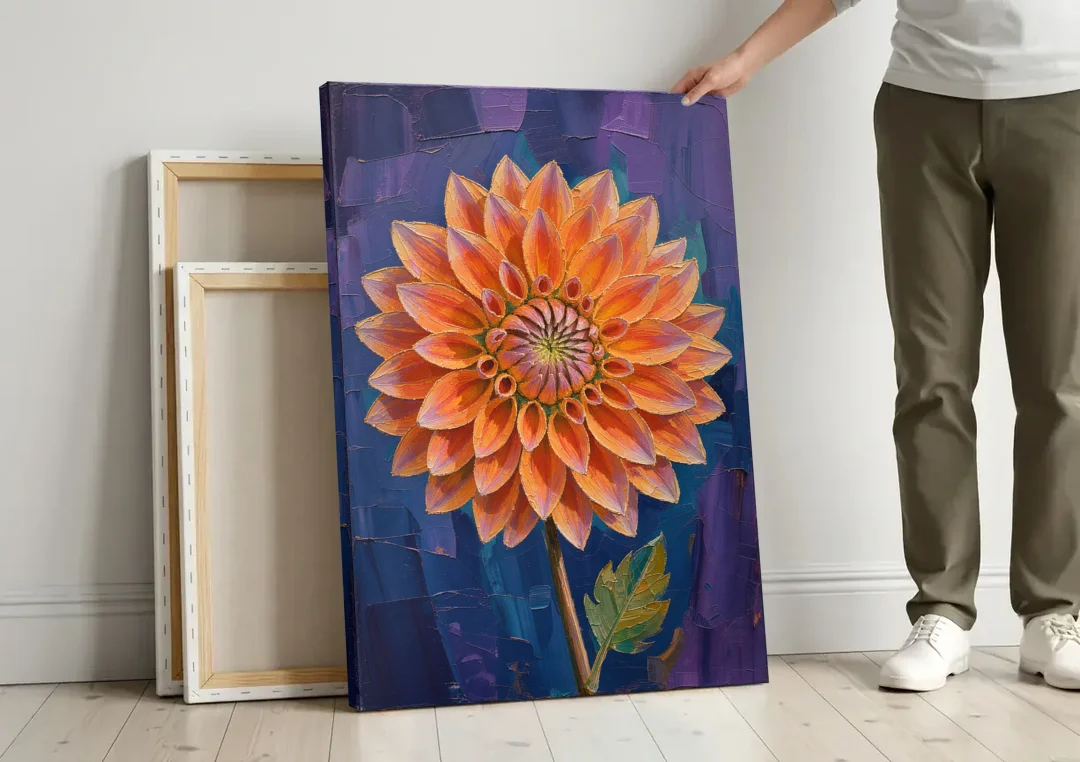 Contemporary Coral Dinnerplate Dahlia at Night canvas wall art leaning against a wall next to blank canvases