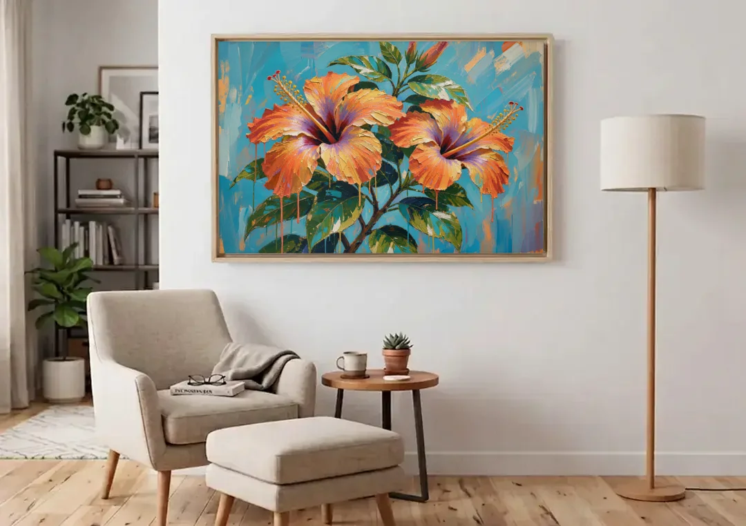 Contemporary Floral Painting of Coral Hibiscus canvas wall art above an armchair in a bright living room