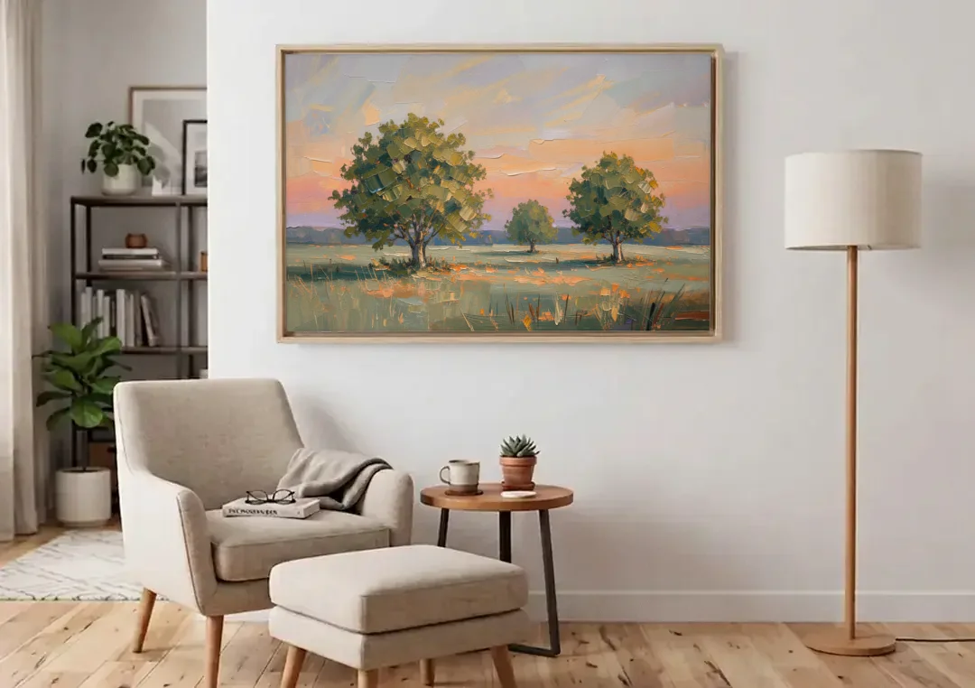 Contemporary Landscape Painting of Three Trees at Dusk canvas wall art above an armchair in a bright living room