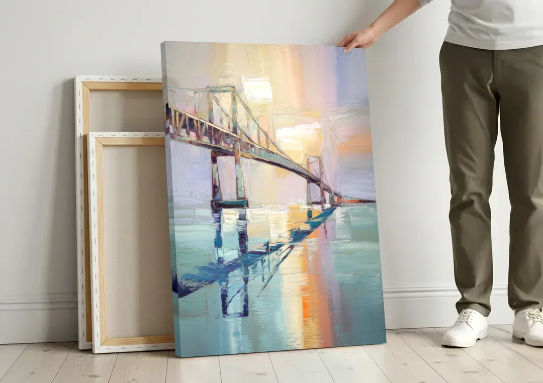 Corpus Christi Harbor Bridge canvas wall art leaning against a wall next to blank canvases