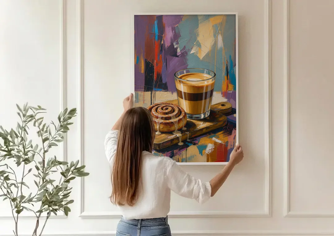 Cortado and Cinnamon Roll for the Coffee Bar canvas wall art being hung on a paneled wall