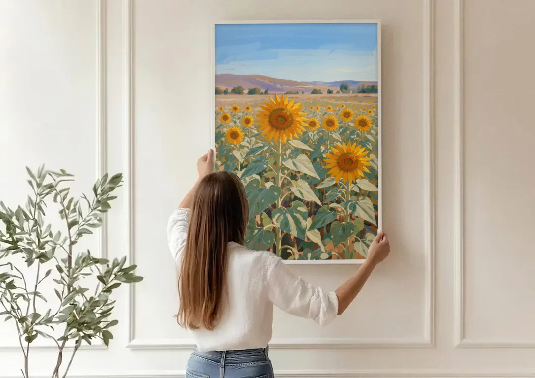 Country Wall Art of a Sunflower Field in Summer canvas wall art being hung on a paneled wall