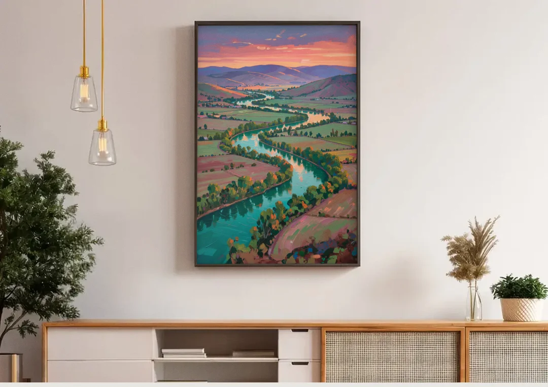 Countryside Oil Painting of a River Valley at Sunset canvas wall art above a wooden sideboard under pendant lights