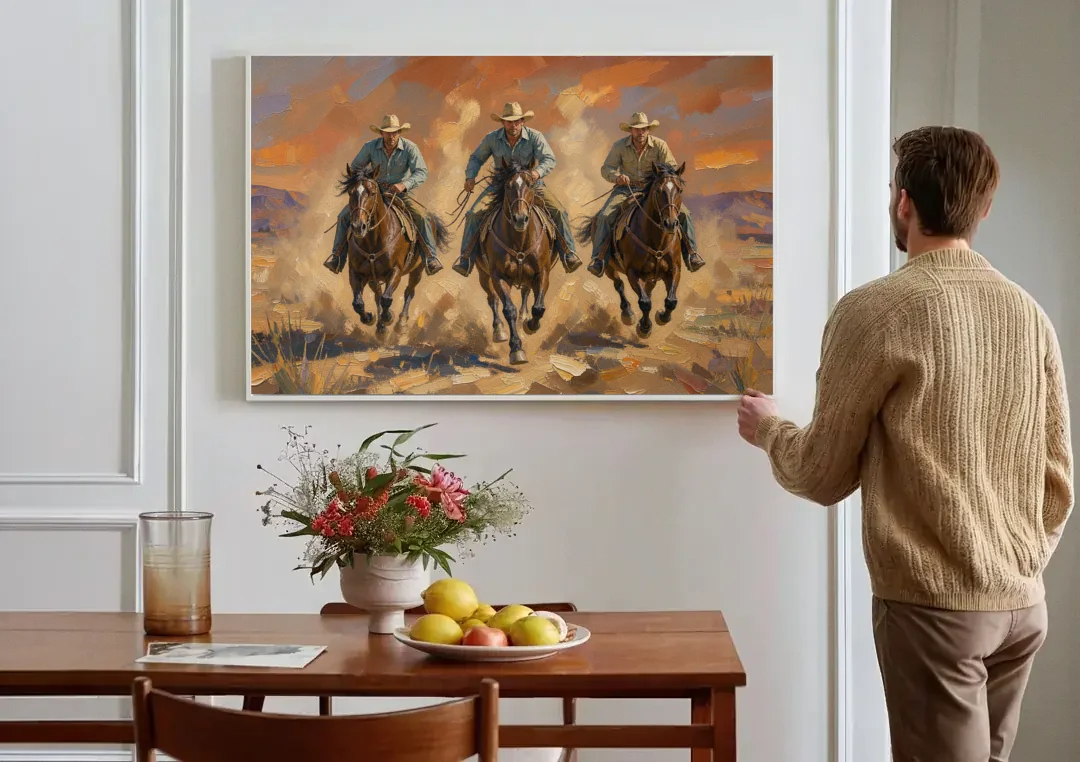 Cowboy Painting of Three Riders Out of the Dust canvas wall art above a dining table