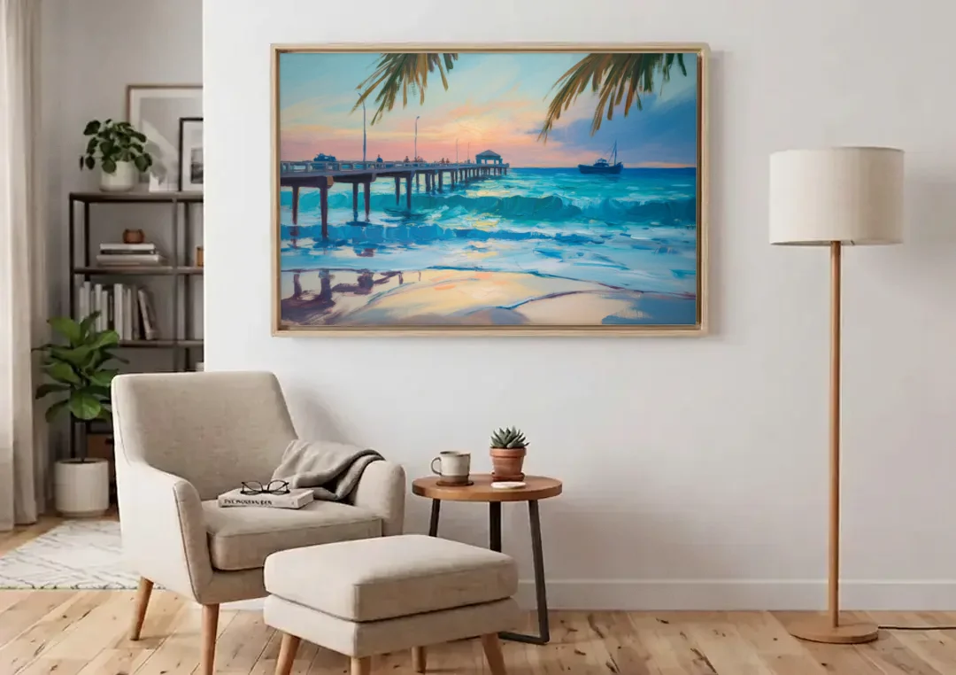 Cozumel Pier Sunrise canvas wall art above an armchair in a bright living room