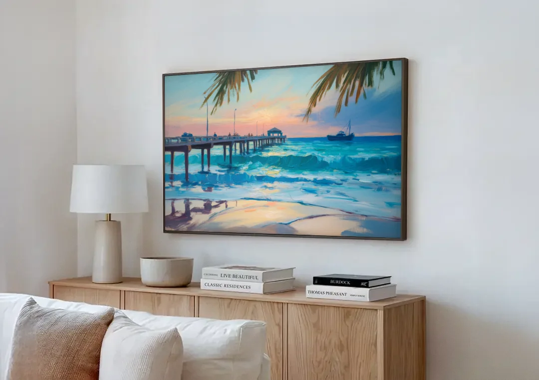 Cozumel Pier Sunrise canvas wall art above a wooden sideboard next to a sofa