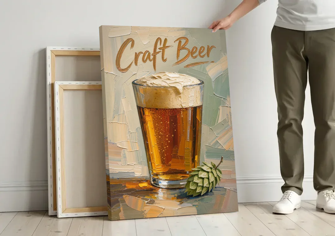 Craft Beer Wall Art with a Foamy Amber Pint canvas wall art leaning against a wall next to blank canvases