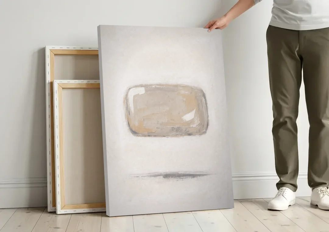 Cream Wall Art with Floating Birch Bark Stone canvas wall art leaning against a wall next to blank canvases