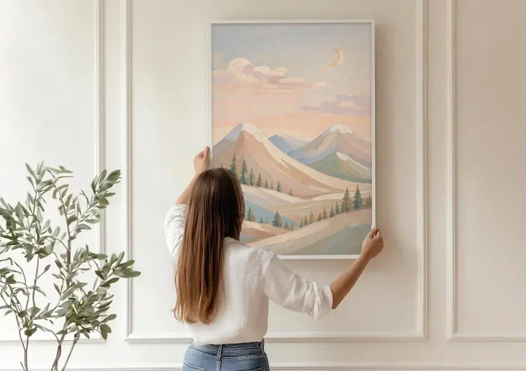 Crescent Moon Over Pastel Mountains for the Nursery canvas wall art being hung on a paneled wall