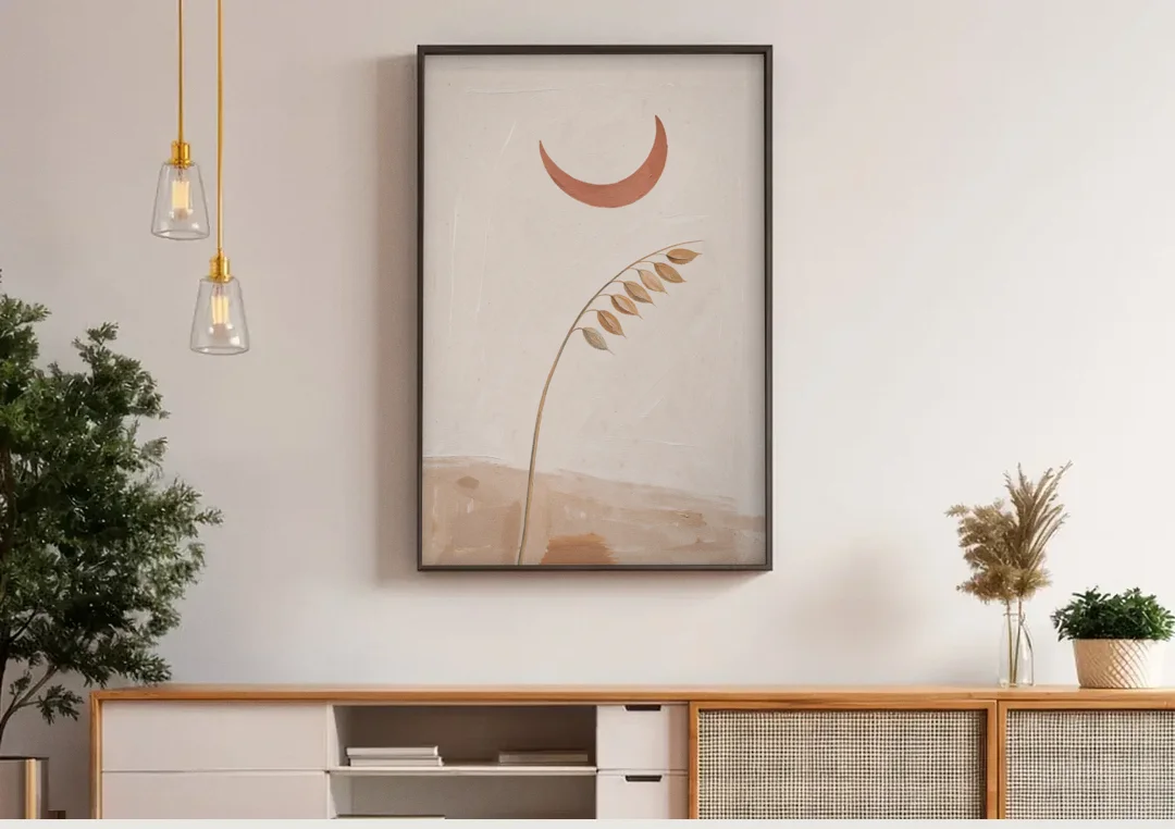 Crescent Moon Painting with a Bowing Grass Stem canvas wall art above a wooden sideboard under pendant lights