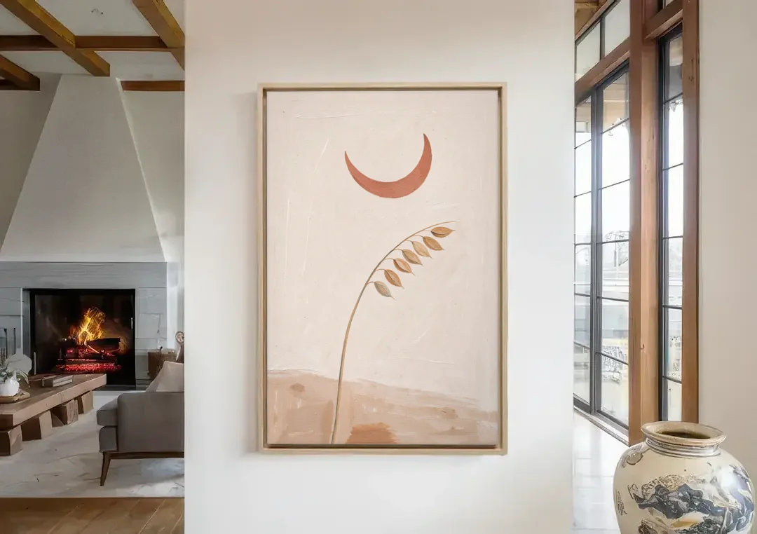 Crescent Moon Painting with a Bowing Grass Stem canvas wall art in a living room with a fireplace