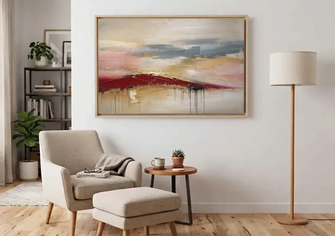 Crimson Ridge with Gold Seams in Ivory Haze canvas wall art above an armchair in a bright living room