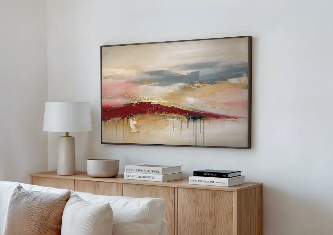 Crimson Ridge with Gold Seams in Ivory Haze canvas wall art above a wooden sideboard next to a sofa