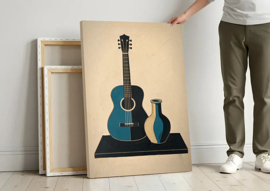 Cubist Still Life Painting of Guitar and Vase canvas wall art leaning against a wall next to blank canvases