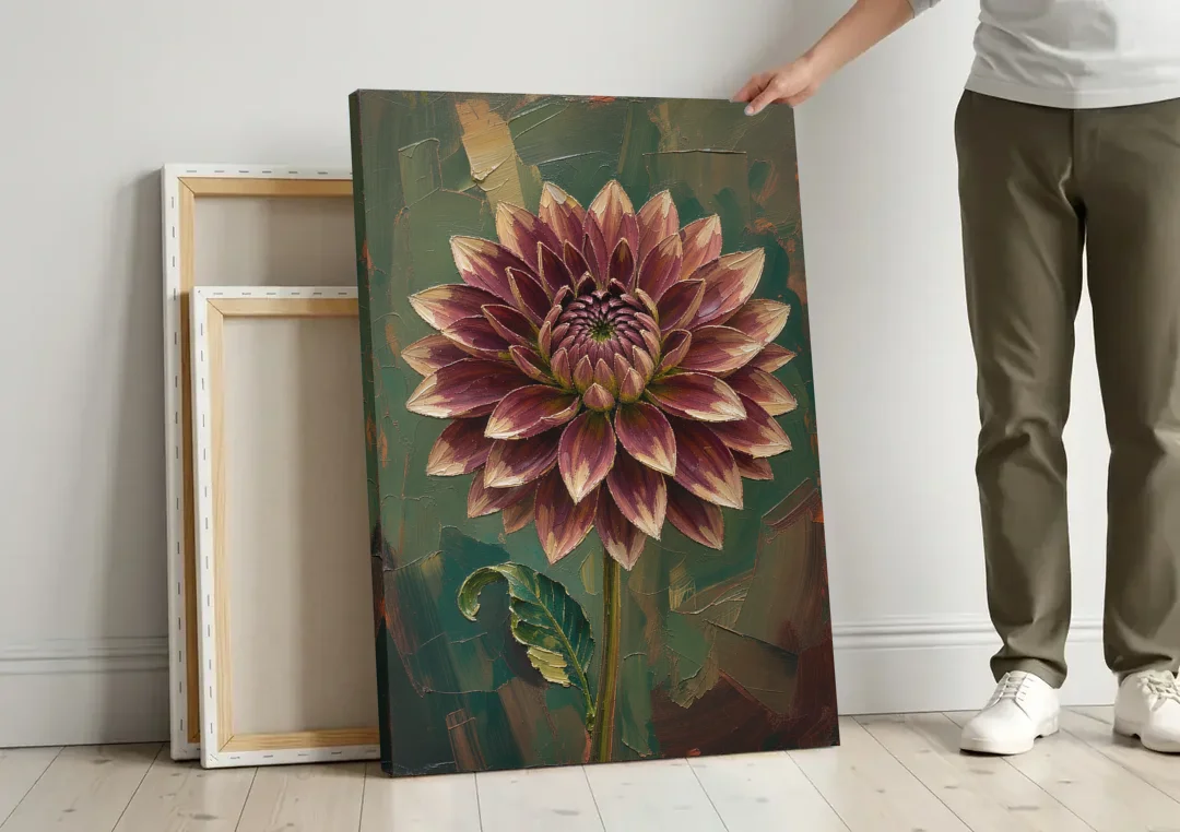 Dark Floral Canvas Art of a Burgundy Dahlia canvas wall art leaning against a wall next to blank canvases