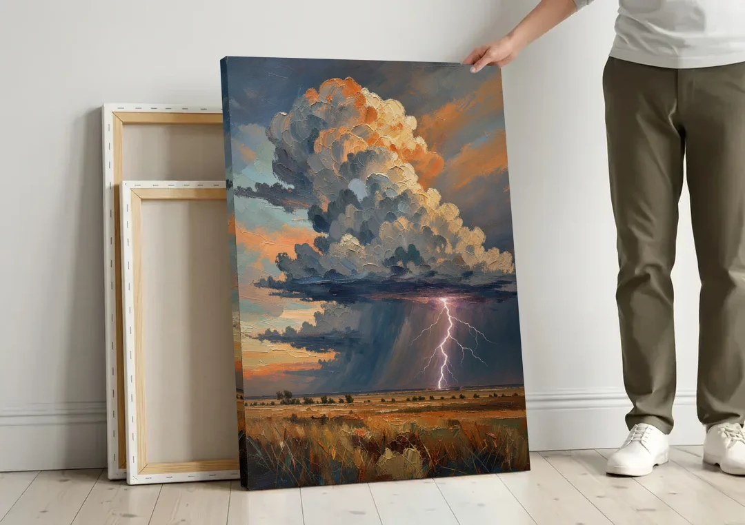 Dark Moody Prairie Thunderhead canvas wall art leaning against a wall next to blank canvases