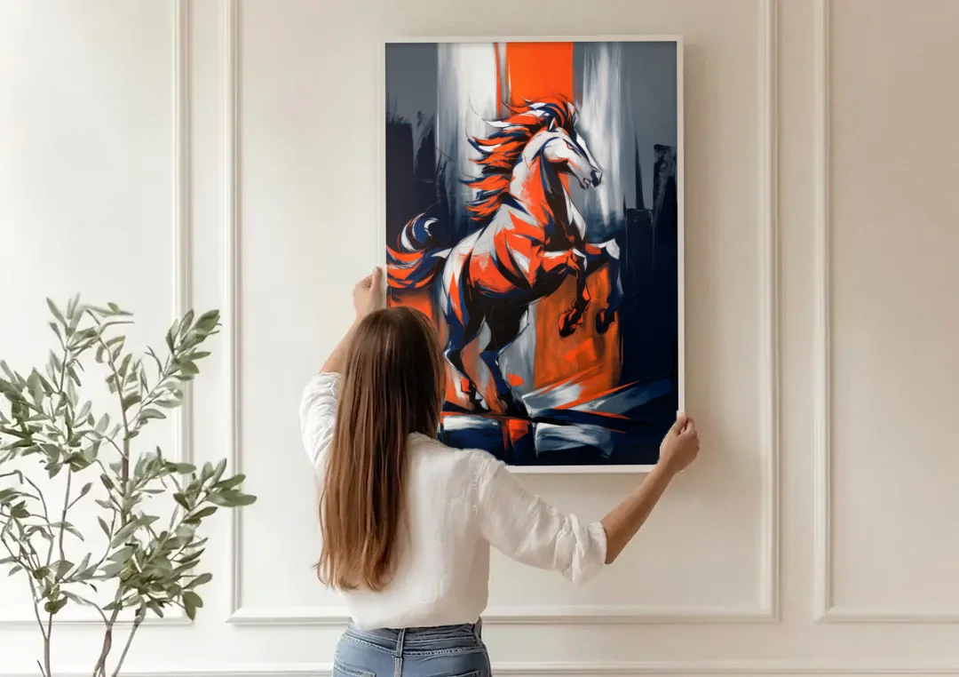 Denver Broncos Legacy canvas wall art being hung on a paneled wall