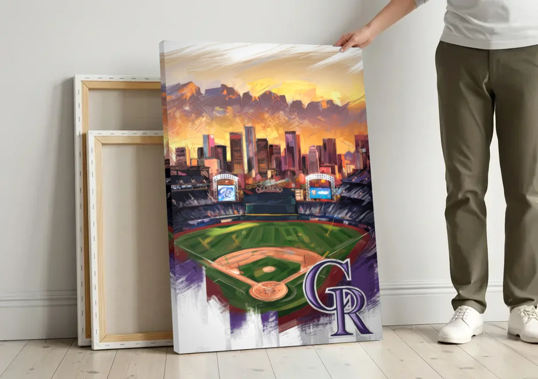 Denver Colorado Rockies canvas wall art leaning against a wall next to blank canvases