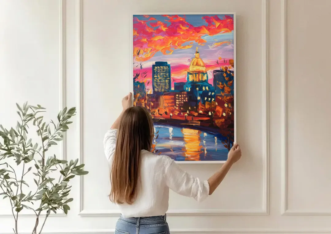 Des Moines Evening Lights canvas wall art being hung on a paneled wall