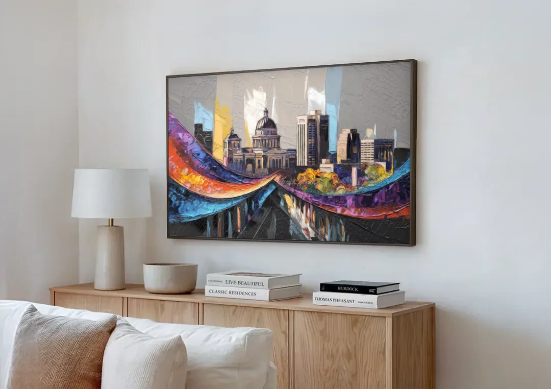 Des Moines Historic Landmarks canvas wall art above a wooden sideboard next to a sofa