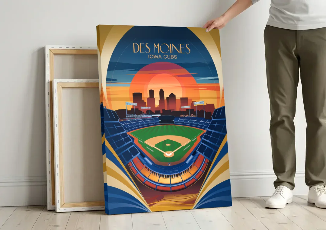 Des Moines Iowa Cubs Stadium canvas wall art leaning against a wall next to blank canvases