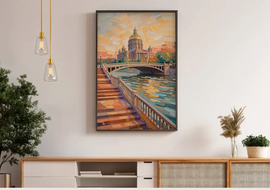 Des Moines Scenic Riverfront canvas wall art above a wooden sideboard under pendant lights