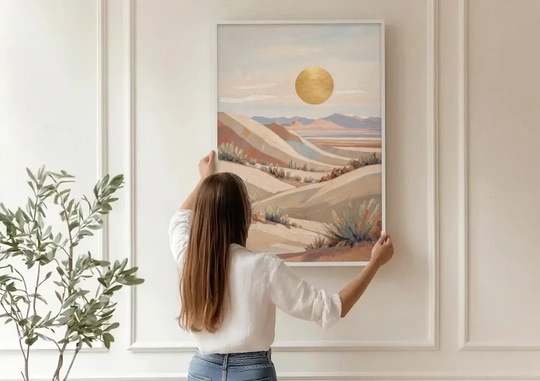 Boho Desert Mountain Ridges Under a Gold Sun canvas wall art being hung on a paneled wall