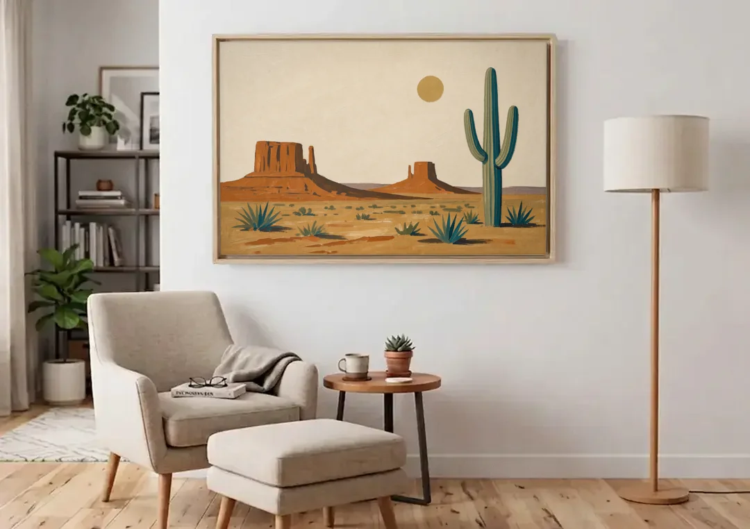 Desert Wall Art with Two Mesas and a Saguaro canvas wall art above an armchair in a bright living room