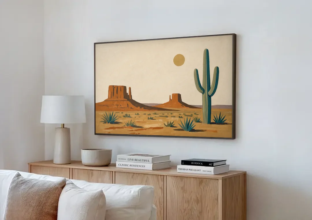 Desert Wall Art with Two Mesas and a Saguaro canvas wall art above a wooden sideboard next to a sofa