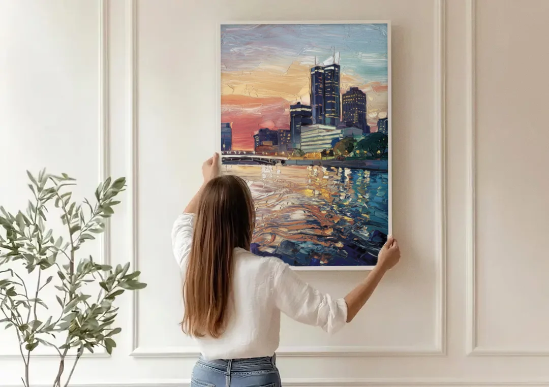 Detroit Riverfront View canvas wall art being hung on a paneled wall