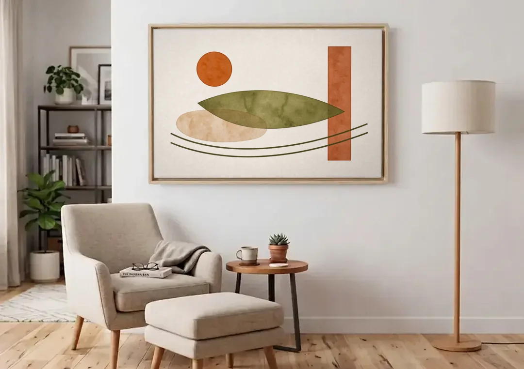 Dining Room Abstract Art with Horizontal Olive Leaf canvas wall art above an armchair in a bright living room