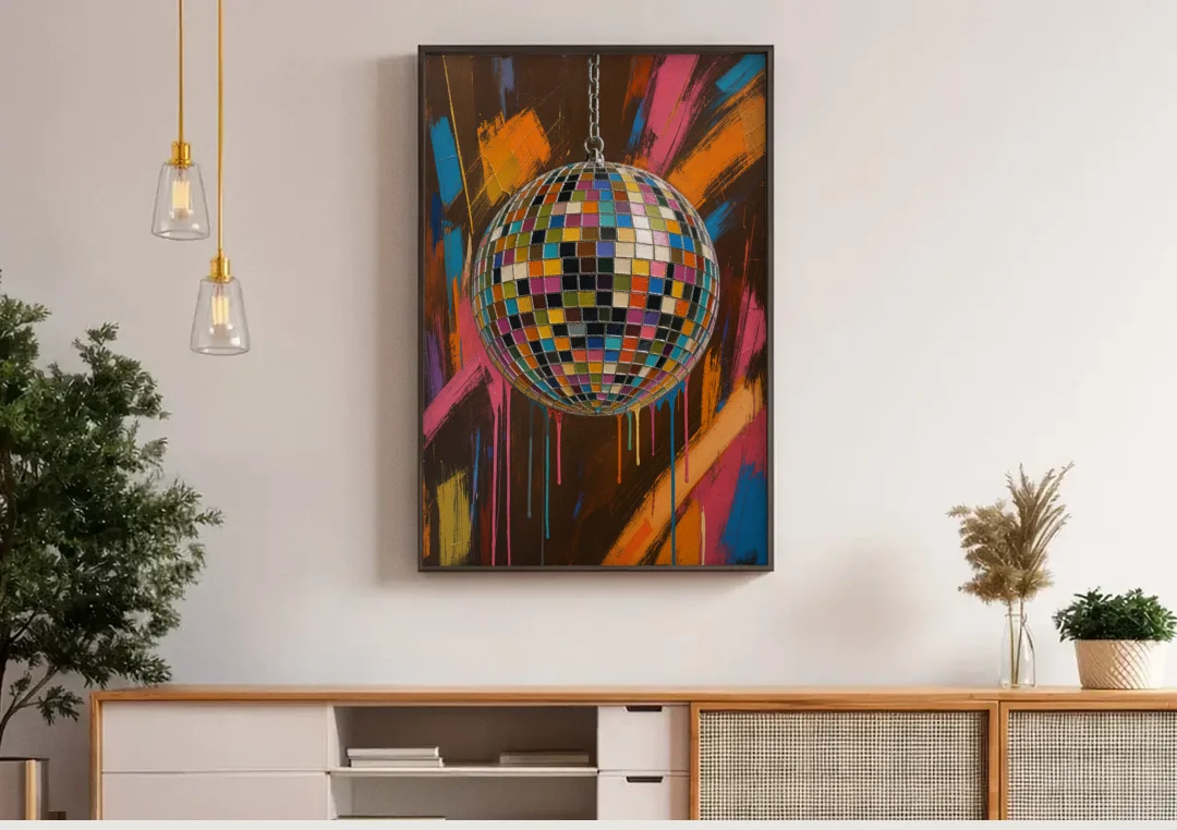 Disco Ball Painting in Bursting Color canvas wall art above a wooden sideboard under pendant lights