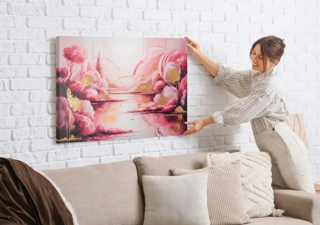 Dreamy Ethereal Pink Abstract canvas wall art being hung on a white brick wall above a sofa