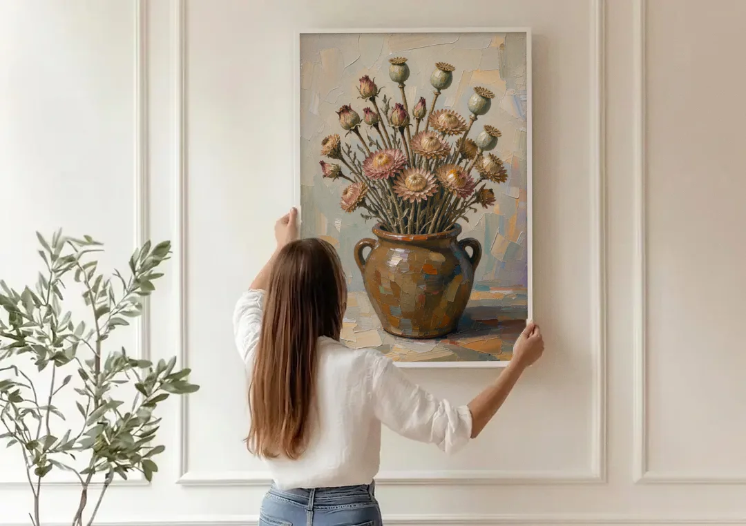 Dried Flower Painting with Poppy Pods in a Crock canvas wall art being hung on a paneled wall