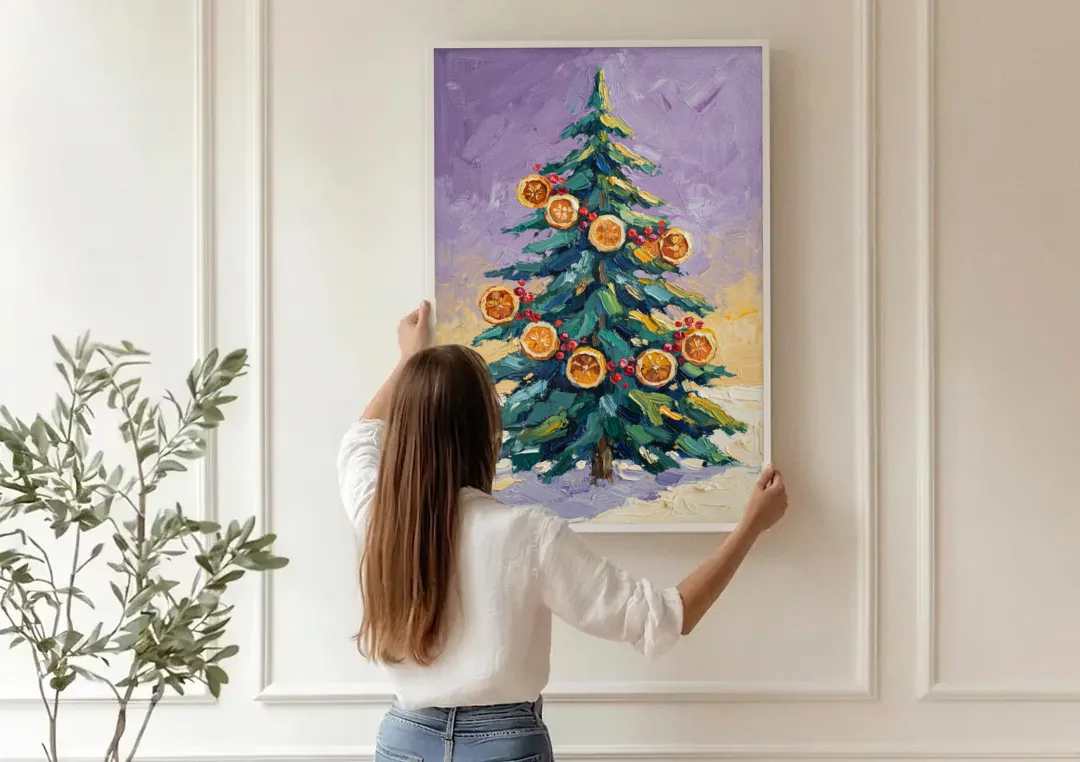 Cozy Christmas Dried Orange Garland Fir canvas wall art being hung on a paneled wall
