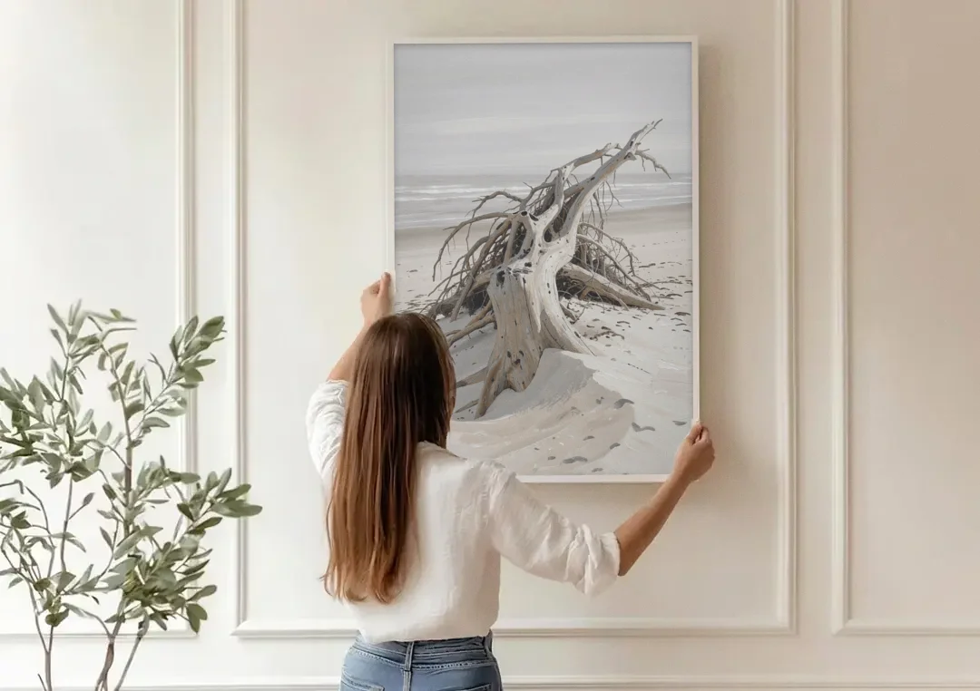 Driftwood Painting of Roots in Pale Sand canvas wall art being hung on a paneled wall