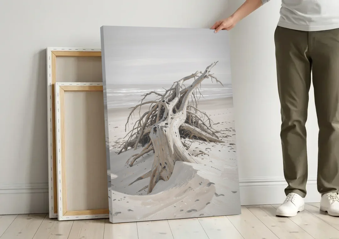 Driftwood Painting of Roots in Pale Sand canvas wall art leaning against a wall next to blank canvases