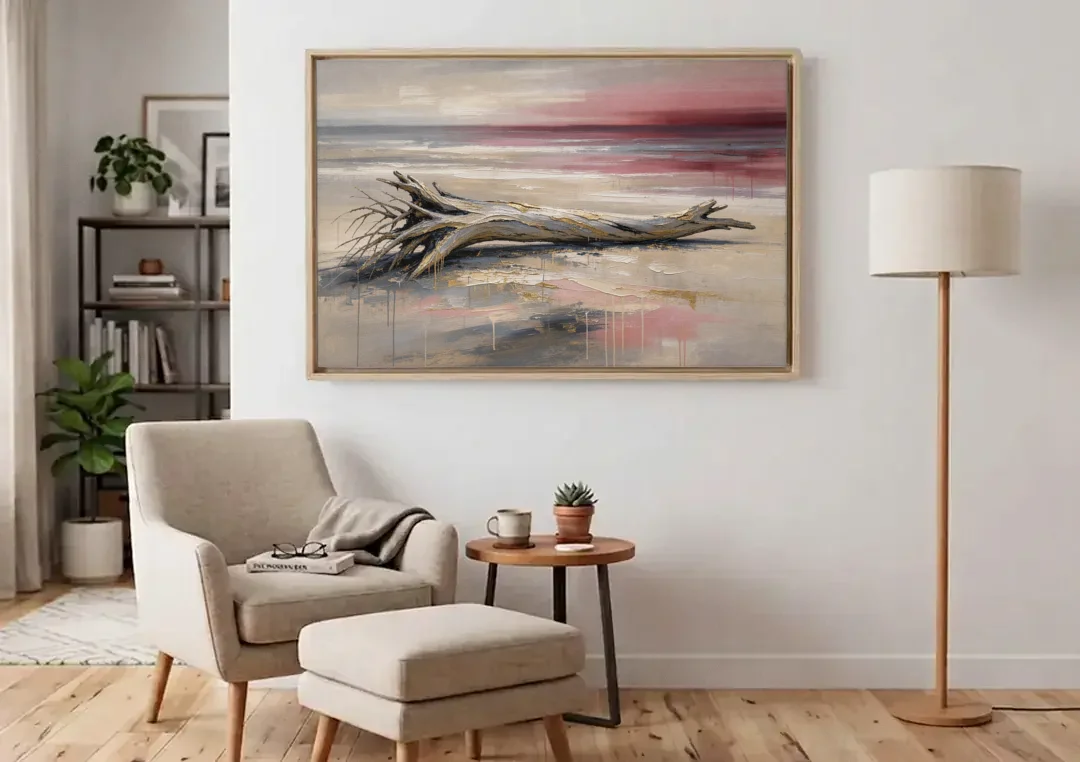Driftwood Wall Art Under a Rose Dusk Sky canvas wall art above an armchair in a bright living room