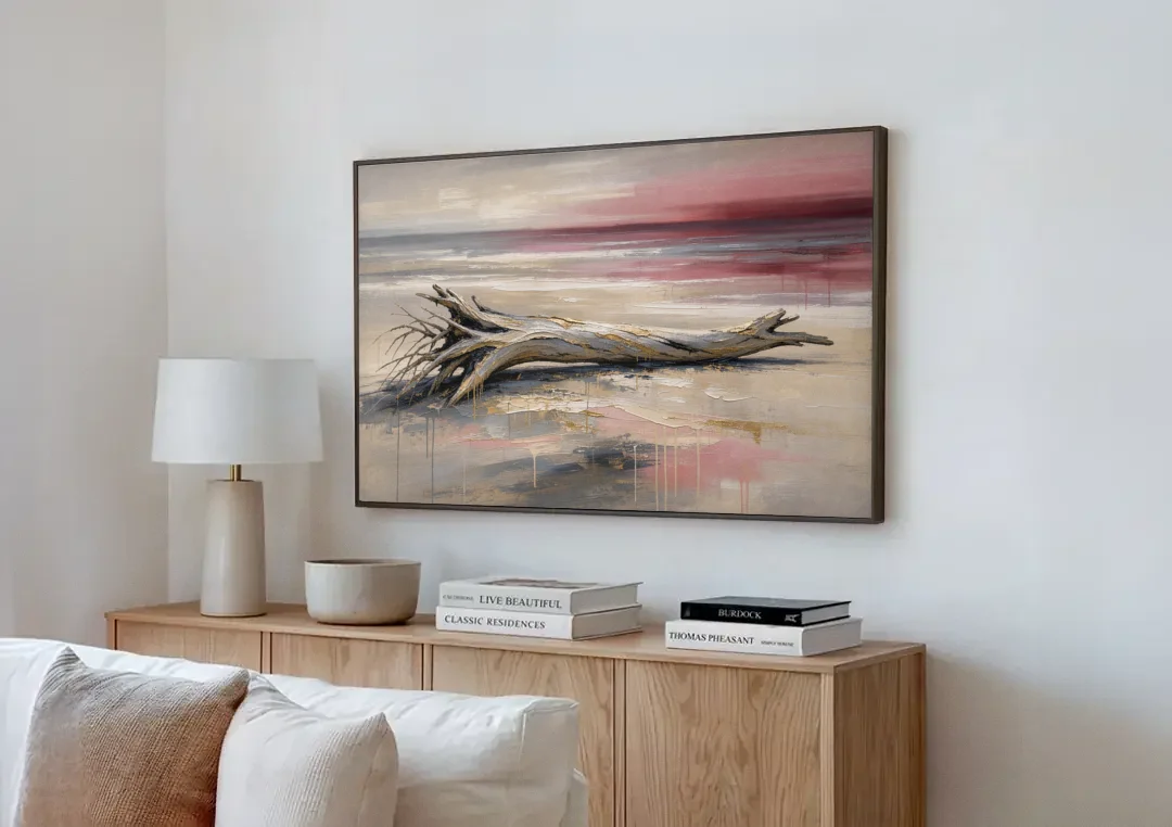Driftwood Wall Art Under a Rose Dusk Sky canvas wall art above a wooden sideboard next to a sofa