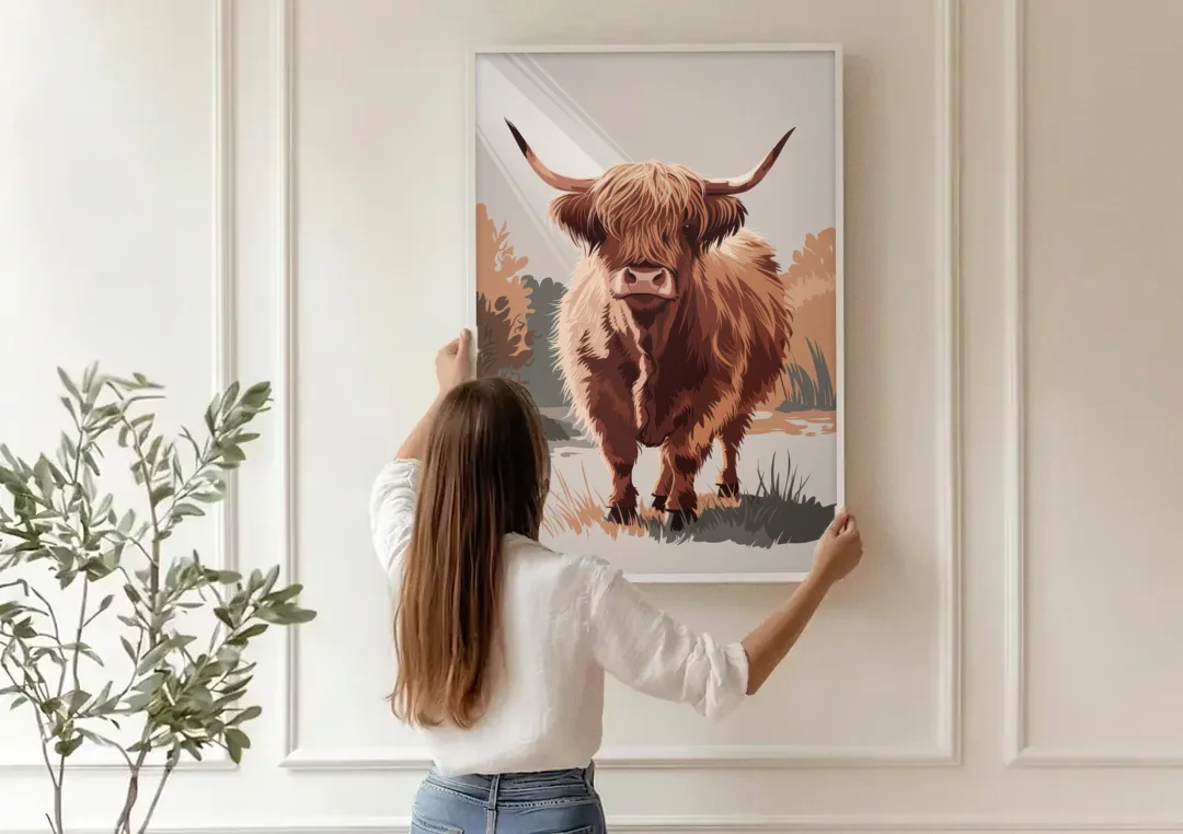 Highland Cows Charm canvas wall art being hung on a paneled wall