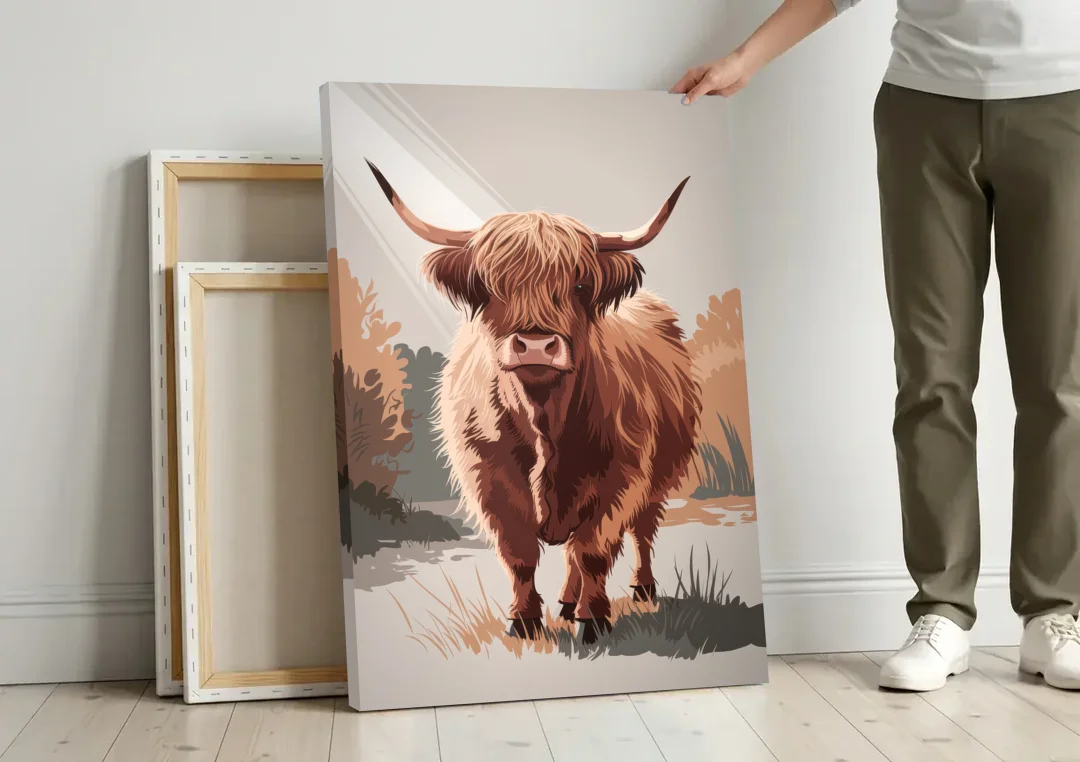 Highland Cows Charm canvas wall art leaning against a wall next to blank canvases