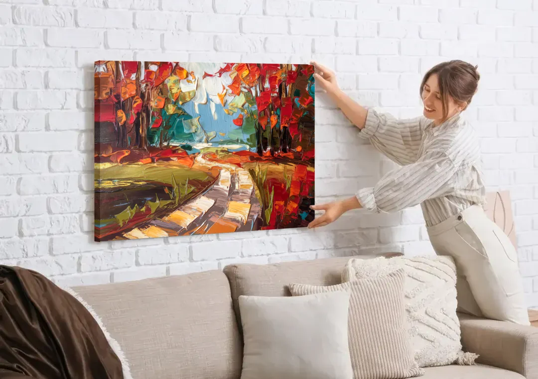 Durham Autumn Colors canvas wall art being hung on a white brick wall above a sofa