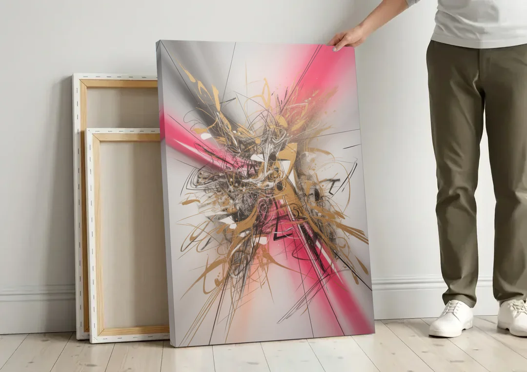 Dynamic Geometric Harmony Pink and Gold Abstract canvas wall art leaning against a wall next to blank canvases
