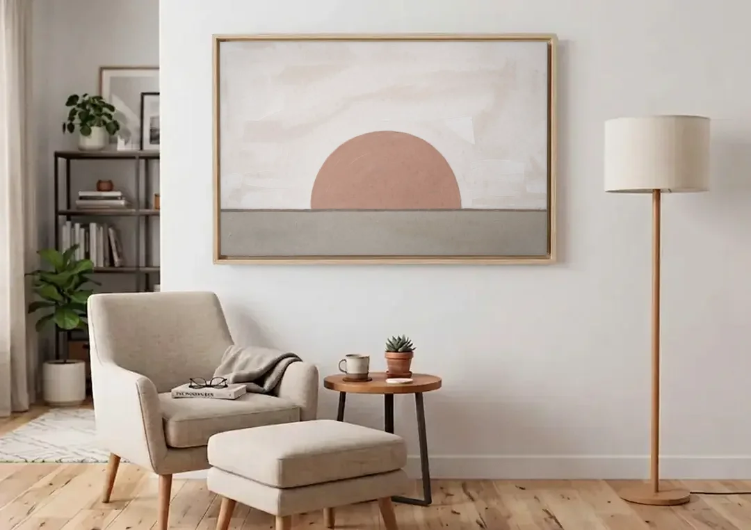 Earth Tone Abstract Art with Adobe Rose Half Sun canvas wall art above an armchair in a bright living room