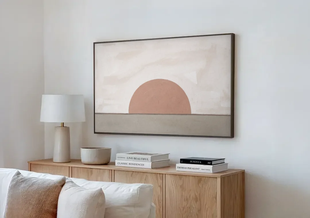 Earth Tone Abstract Art with Adobe Rose Half Sun canvas wall art above a wooden sideboard next to a sofa