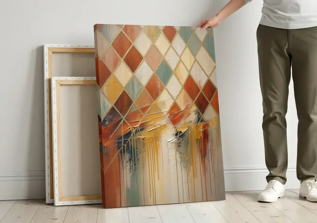 Earth Tone Abstract Painting of a Melting Lattice canvas wall art leaning against a wall next to blank canvases