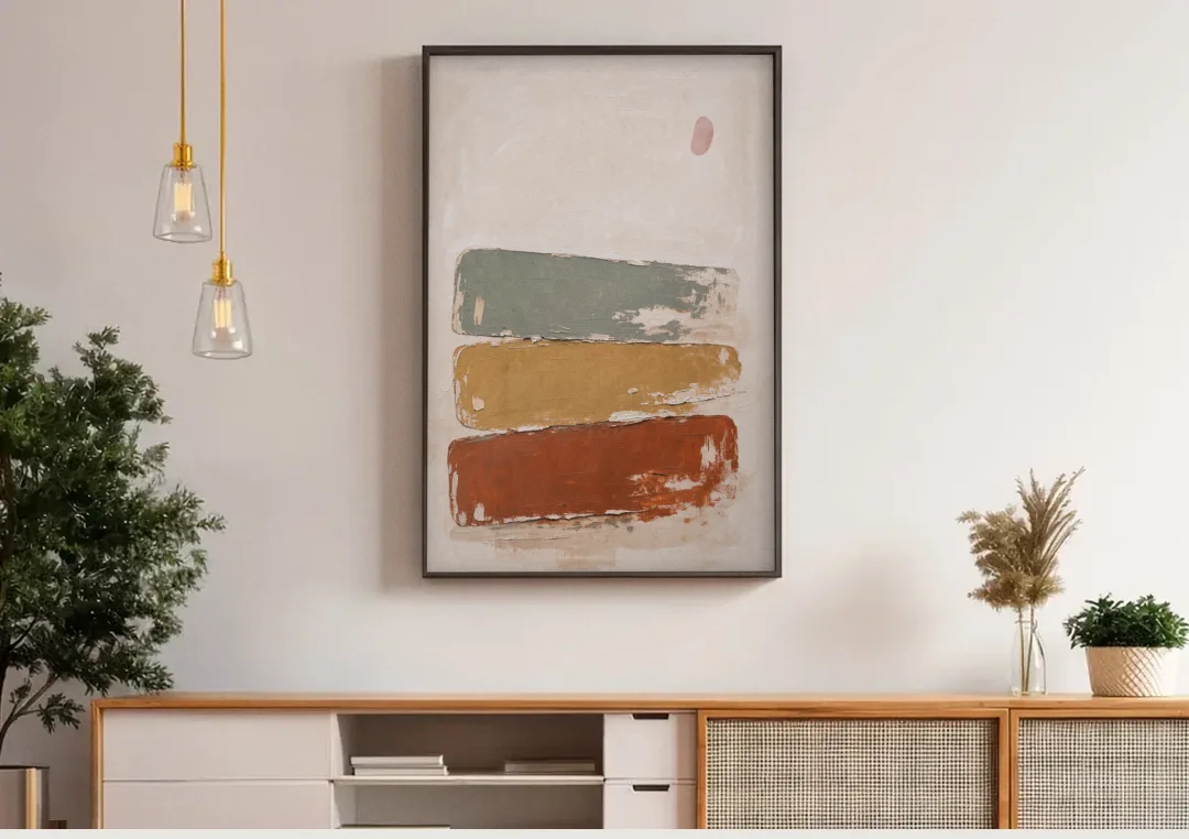Earthy Abstract Painting with Blush Pebble canvas wall art above a wooden sideboard under pendant lights