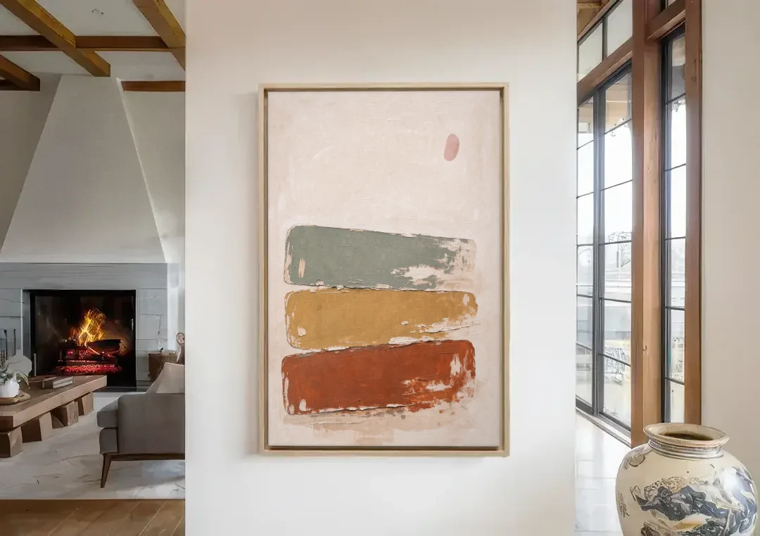 Earthy Abstract Painting with Blush Pebble canvas wall art in a living room with a fireplace